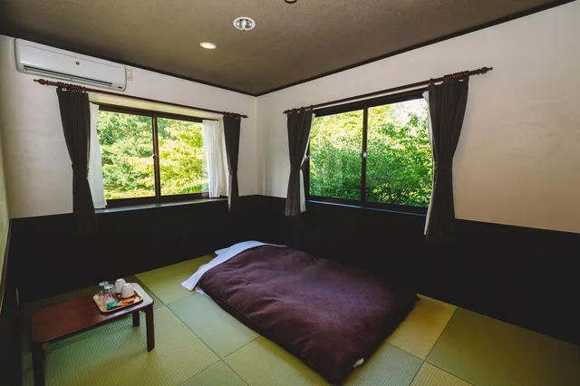 غرفة يابانية بفراش فوتون، Akagawa Onsen Spaju (Aso Kuju National Park) 1/1