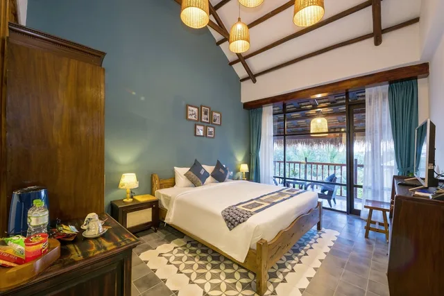 غرفة ديلوكس بسرير كينج، Zest Villas And Spa Hoi An 1/2