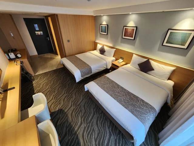 غرفة عائلية بسريرين منفصلين بشرفة، Seogwipo JS Hotel 4/10