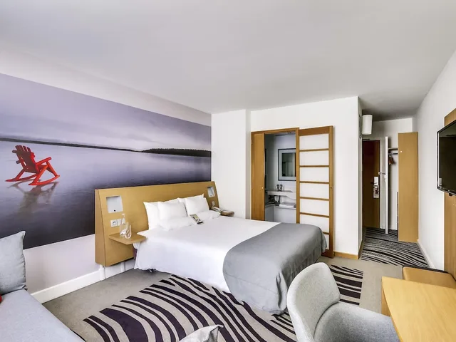 غرفة كلاسيكية عائلية بسرير مزدوج مع أريكة مع أريكة، Novotel Paris Centre Gare Montparnasse 4/7