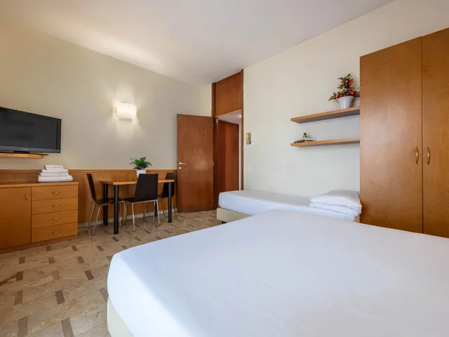 غرفة بسرير كوين بمطبخ صغير، iH ApartHotels Milano Argonne Park 4/4
