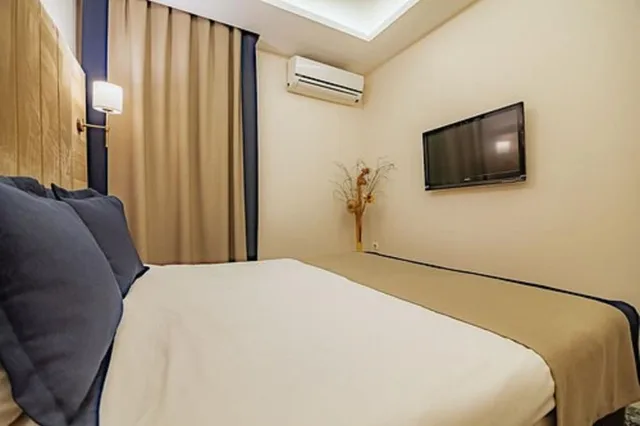 غرفة اقتصادية بسرير كوين، Comfort Beige Hotel 4/5