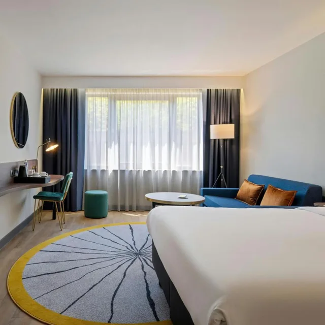 غرفة تنفيذية مع أريكة، The Belson Brussels, a Tribute Portfolio Hotel 1/4