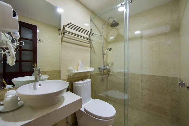 Family Suite, 1 Single and 2 Queen Beds, City View, Balcony, S Central Hotel 4/4