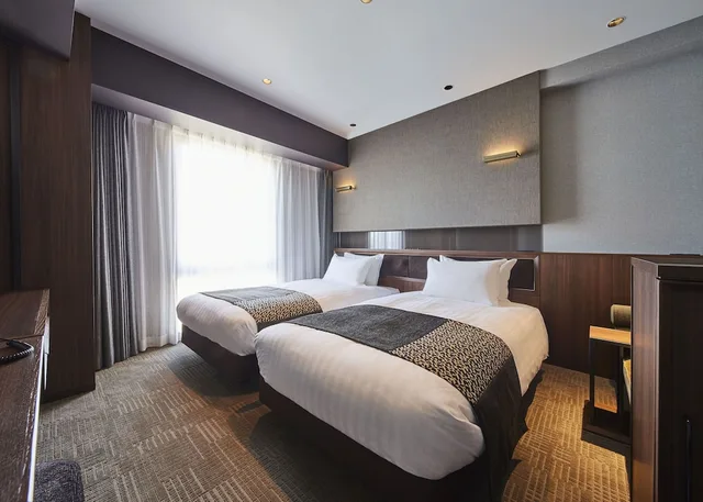 غرفة بسريرين منفصلين في المبنى الرئيسي، Hotel Trad Hakata 1/2