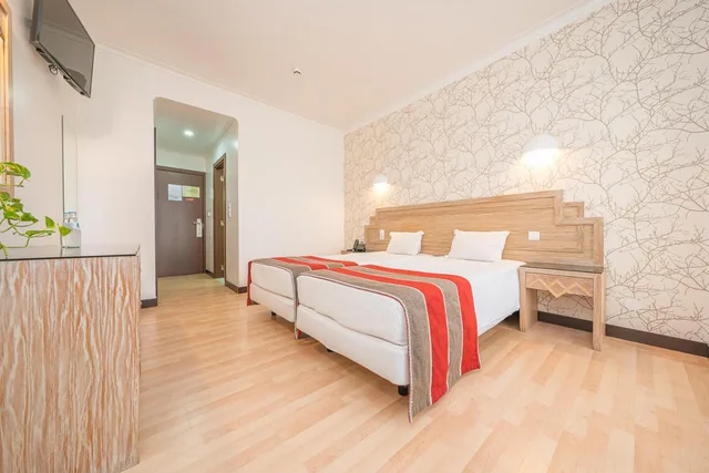 غرفة بسرير مزدوج أو سريرين منفصلين مع سرير إضافي، Hotel Melius 1/2