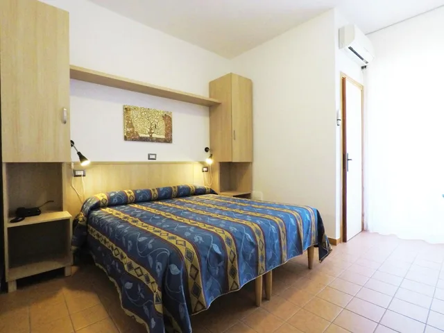غرفة كلاسيكية ثلاثية بسرير كوين وسرير فردي، Hotel La Vetta Europa 1/3