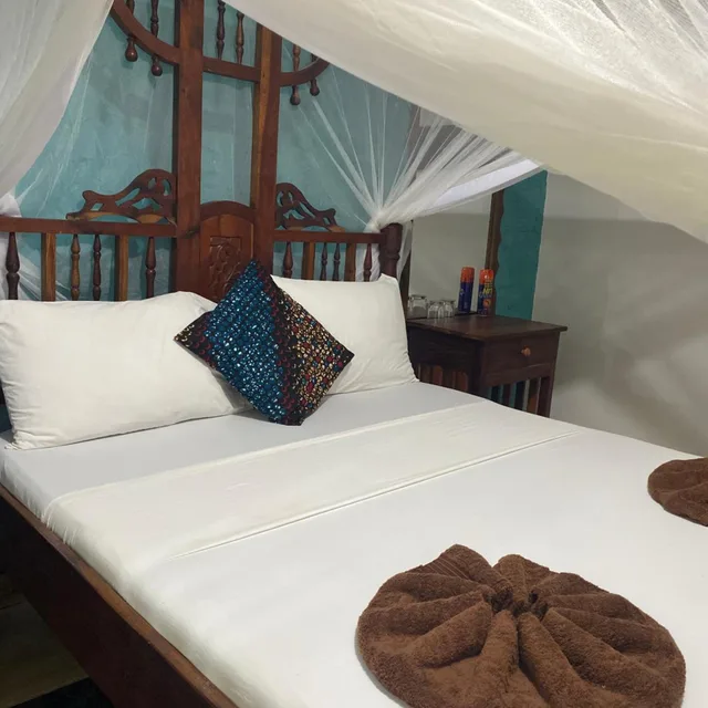 غرفة بسرير مزدوج بإطلالة على الحديقة، Mbuyuni Beach Village 6/10