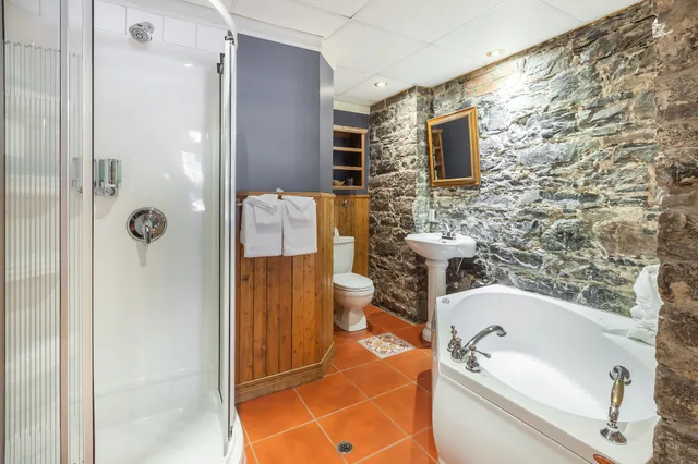 جناح جونيور بسرير كوين مع أريكة، Acadia Hotel 9/9