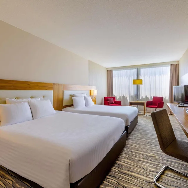 غرفة عائلية بسرير كينج وسرير كوين، Movenpick Hotel Geneva 6/8