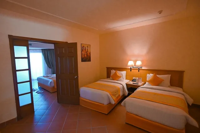 Family Double Suite with Garden View 2A+3C، Charmillion Gardens Aqua Park Ex Sea Gardens Resort 2/10