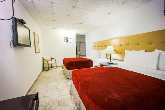 Room, 2 Double Beds, Coral by the Sea 1/1