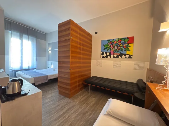 غرفة قياسية رباعية بسرير مزدوج وسريرين منفصلين، Hotel Europa 3/10