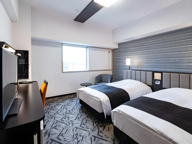 غرفة بسريرين مزدوجين، Apa Hotel Resort Sapporo 1/2