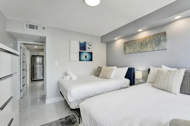 Beach, 2 Queen and 2 Double Beds, Ocean Front, Sofa, The Alexander All Suite Oceanfront Resort 2/4
