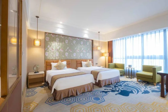 غرفة تنفيذية بسريرين منفصلين بإطلالة على المدينة، Huayu Landmark Hotel 2/2