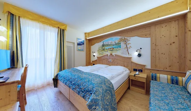 غرفة كومفورت ثلاثية بسرير مزدوج وسرير فردي، Hotel Madonna Delle Nevi 1/7