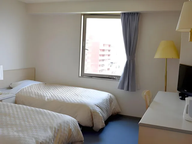 غرفة ركنية بسريرين منفصلين، Hotel Lexton Tokunoshima 1/2