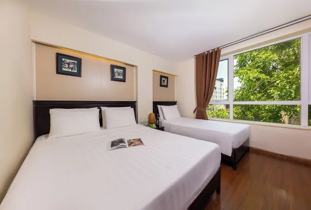 غرفة ديلوكس ثلاثية بسرير مزدوج وسرير فردي، CENTRE POINT HANOI HOTEL 3/4
