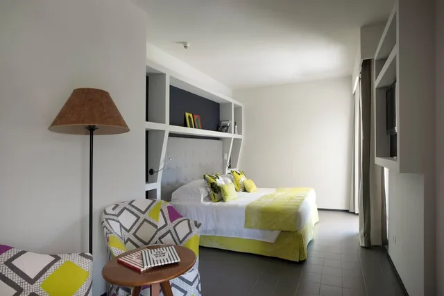 جناح جونيور ديلوكس بسرير كينج وسرير فردي مع أريكة، Hermitage Hotel And Resort 1/6