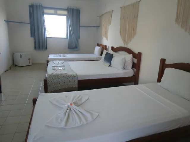 جناح ديلوكس رباعي بسريرين منفصلين، La Suite Praia 2/9