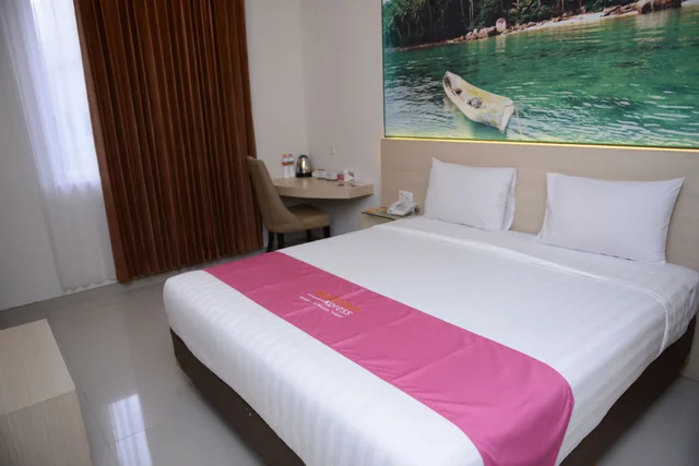 Groovy, King Bed، Midtown Xpress Sampit Kalimantan Tengah 2/4