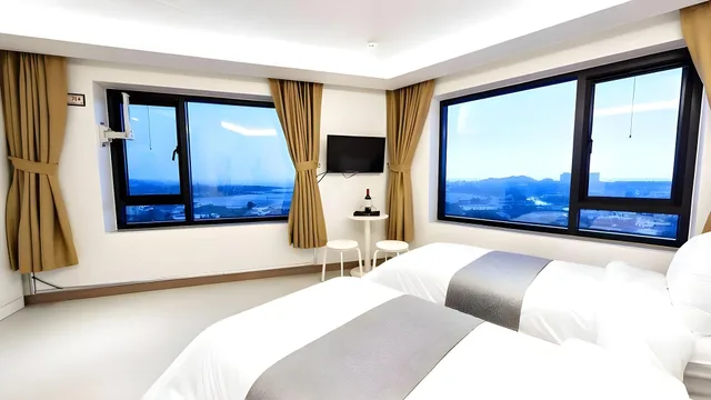 غرفة ديلوكس بسريرين منفصلين بإطلالة على البحر، Rezion Tourist Hotel 1/3