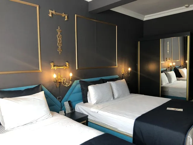 غرفة كلاسيكية بسرير مزدوج وسرير فردي بغرفة نوم واحدة، My House Otel 1/10