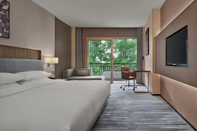 غرفة ديلوكس بسرير كينج، Dongguan Forum Hotel and Apartment 1/3