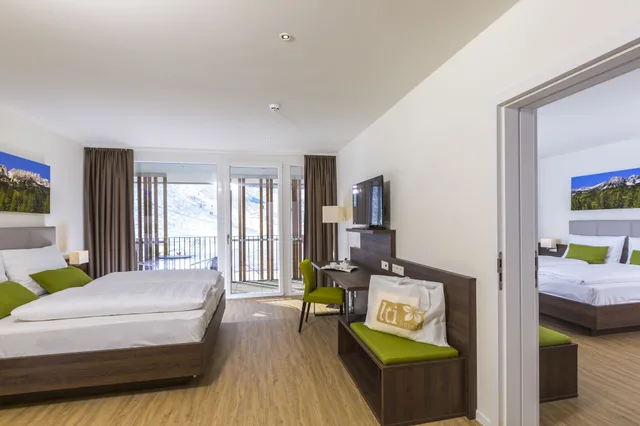 غرفة عائلية بسريرين كوين بشرفة، Lti Alpenhotel Kaiserfels 1/7