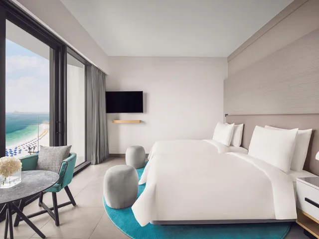 غرفة بريميوم بسريرين منفصلين، Movenpick Resort Al Marjan Island 1/6
