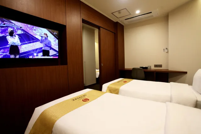 غرفة عائلية بسرير مزدوج وسريرين منفصلين، Hotel Skypark Myeongdong Ii Seoul 1/10