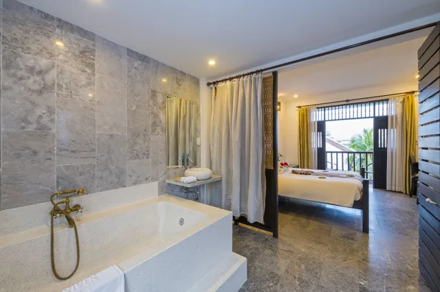 غرفة ديلوكس بسرير كينج بإطلالة على النهر، Hoi An Coco River Resort Spa 9/9
