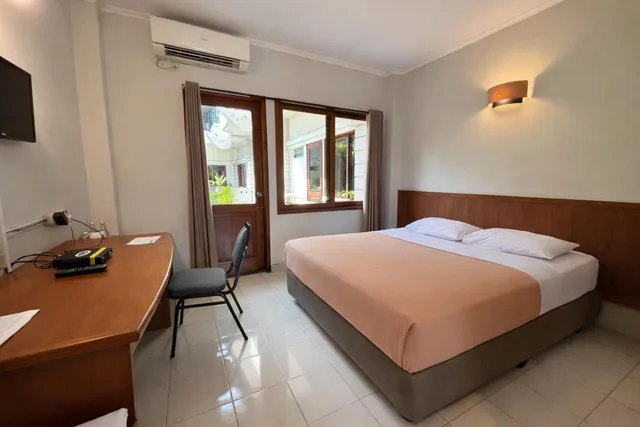 غرفة بسرير مزدوج بشرفة، Hotel Winotosastro Garden 2/8