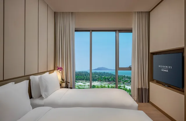 غرفة بسرير كينج وسرير كوين وسرير فردي بغرفتي نوم، Hoiana Residences 3/4