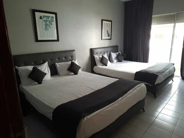 غرفة كومفورت رباعية بسريرين كوين، Al Baraka Hotel 3/6