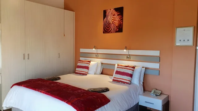 Deluxe, King Bed, Wind-Rose Guest House 3/4