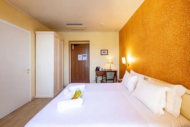 غرفة ديلوكس بسريرين منفصلين بإطلالة على البحيرة، Hotel Pallanza 1/7