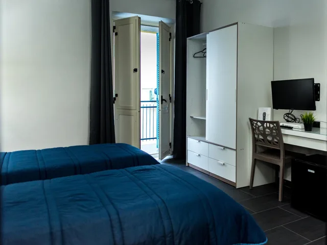 غرفة بسرير مزدوج أو سريرين منفصلين، Hotel Scigliano 3/10