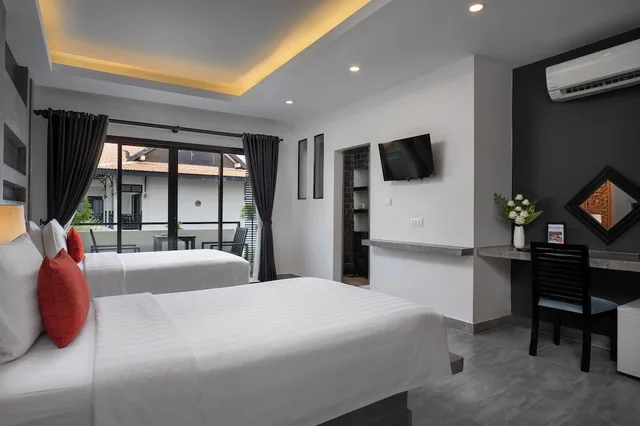 Deluxe Twin Free one way transfer، CENTRAL SUITE RESIDENCE 4/10