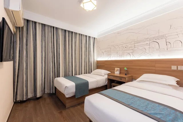 غرفة عائلية بسرير مزدوج وسرير فردي، Zhongan Hotel Beijing 2/5