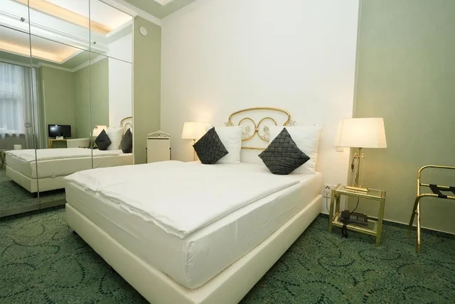 Suite, King Bed, Hotel Palmenhof 1/9