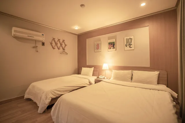 Deluxe, 1 Double and 1 Single Bed, JEJU STAY HOTEL OF JEJU CITY 2/10