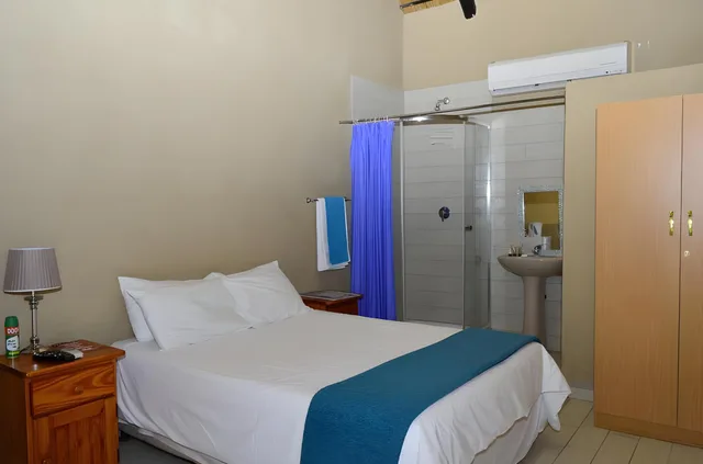غرفة قياسية بسرير كوين، Sand River Resort 2/3