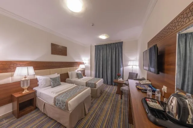 غرفة بسريرين منفصلين، فندق سنود الريان للخدمات الفندقية(Snood Al Rayyan Hotel) 4/7