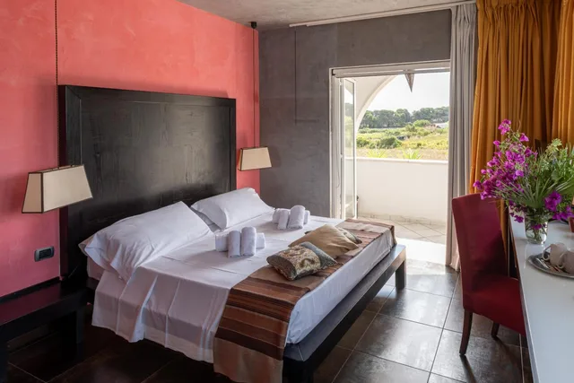 غرفة كبيرة بسرير مزدوج، Resort Baia Dei Turchi 5/10