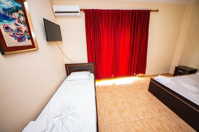 غرفة عائلية بسرير كوين وسرير فردي بشرفة، Hotel Primavera 9/10
