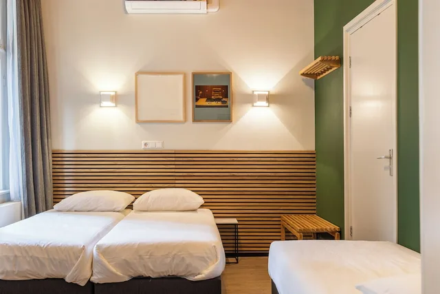غرفة أساسية ثلاثية بسرير كوين وسرير فردي، Hotel Freeland 2/4