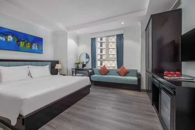 غرفة ديلوكس بسرير كينج بإطلالة جزئية على البحر، BlueSun Danang Beach Hotel 6/10