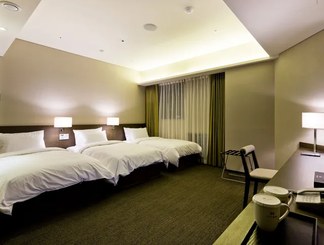 غرفة ثلاثية بثلاثة أسرّة، Hotel Manu 5/8
